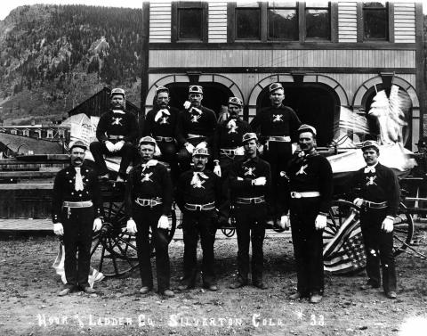 The Silverton Volunteer Fire Department posed in front of the old Town Hall on Blair Street on July 4, 1891. The San Juan County Historical Society is seeking old photos of the building, particularly showing the upper front of the structure, for a historical assessment. If you have one, please send it to Bev Rich, bevrich@frontier. net or call 387-5781. Photo: San Juan Historical Society