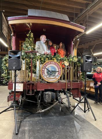 (L to R)- Richard Ballantine owner of Durango Herald, Former Senator Ellen Roberts and former Mayor of Durango Christine Renderlie present to crowd off of Al Harper’s private car parked in the DSNGRR Museum. Photo credit DeAnne Gallegos