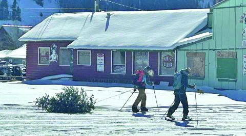 Photo credit Ken Webb What makes Silverton, Silverton, the Christmas tree headed home.