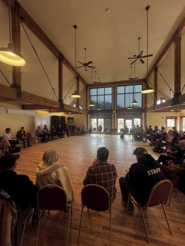 Room full of locals at Kendall Mountain Community Center listening to Attorney General Weiser. Photo credit DeAnne Gallegos