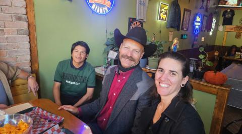 Sheriff Lowrance’s son sitting with Dean and Bre Mize at the Alpine Tavern event on Sunday photo by Alpine Tavern