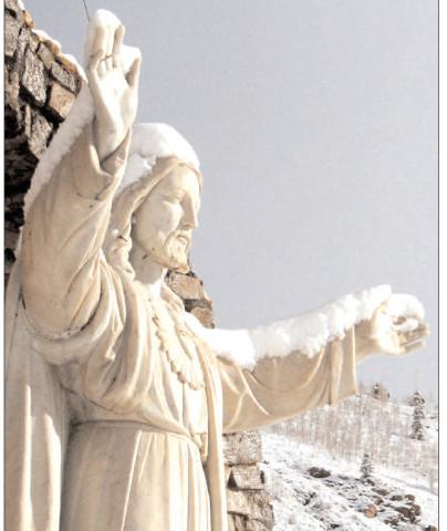 A light snow falls on the Christ of the Mines Shrine above Silverton on Monday morning, April 16, 2012. Photo: Mark Esper/Silverton Standard &amp; the Miner files.