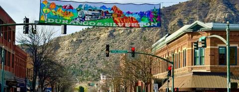 (TOP) photo by DeAnne Gallegos Downtown Durango shares some love for Silverton on a new banner crossing Main Street