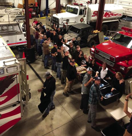 Silverton Volunteer Fire Dept. helps Santa get the candy ready for his Christmas Eve visit. Photo by Silverton Fire Dept