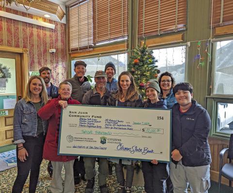 The recipients of the San Juan County Community Fund get a giant check!