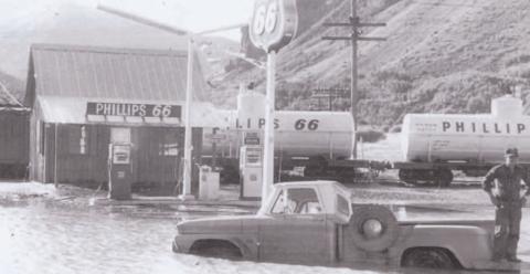 The Phillips 66 station at the wye is pictured during the flood of September 1970. Standing on the back of the truck is Jim Melcher. Photo courtesy of San Juan County Historical Society