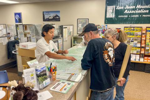 Shoppers at at SJMA bookshop. Photo credit SJMA