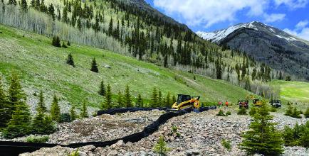 Repository construction on tailings Impoundment 4 Photo by EPA