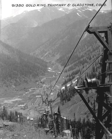 GOLD KING TRAM, 1906 Photo courtesy San Juan County Historical Society The Gold King Mill Tramway and ore buckets near Gladstone around 1906. Buildings in Gladstone include multi-story boarding houses and Mogul Mill buildings. The Silverton, Gladstone &amp; Northerly railroad tracks can be seen near dirt roads and Cement Creek.