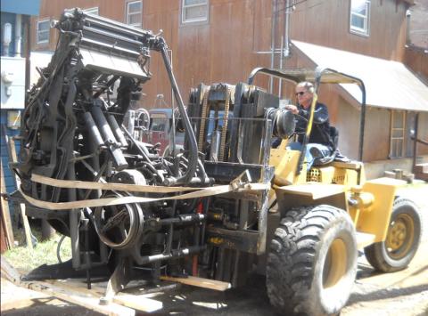 In May of 2017, Ken Safranski is shown with the Museum’s Model 8 Linotype loaded after being rolled out from the former Silverton Standard building on Greene Street.