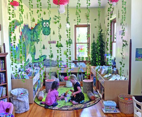 Kids playing in the new children’s reading room at the Silverton Library Photo credit Katey Fetch