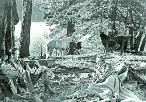 Actor Mark Stevens as Jeff Keane and Coleen Gray as Joan Hartley camping out in a scene from the 1949 movie “Sand.” The movie, much of which was filmed in the Silverton area, was shown Friday and Saturday nights, Aug. 31 and Sept. 1, 2012, as part of the first-ever Silverton Western Movie Festival. Photo courtesy of San Juan County Historical Society