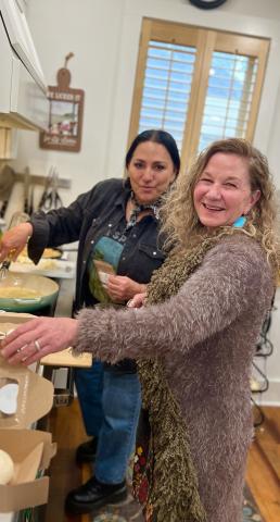 Angelina Noble &amp; Lisa Risoli sauteing mushroom melody photo by DeAnne Gallegos