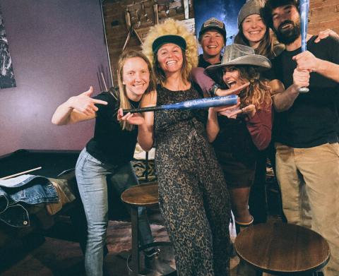 The Den’s Drag Trivia Night’s winning team, L-R: Jill Bagalini,, Krista Beyer, Hannah Green, Anne Chase, Dustin, and front center Critt Kuenning photo by Evin Harris