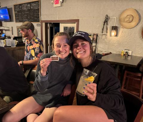 photo by Sarah Moore Silverton locals Natalie Platt &amp; Lucy Mulvihil celebrate with SJDA with a party thrown at the El Bandito by showing off the new sticker featuring the sign.