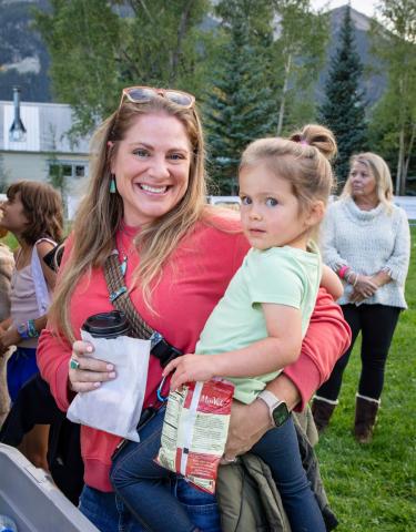 Leah Ham and her daughter having a good time at the arts festival photo by Cracked Compass