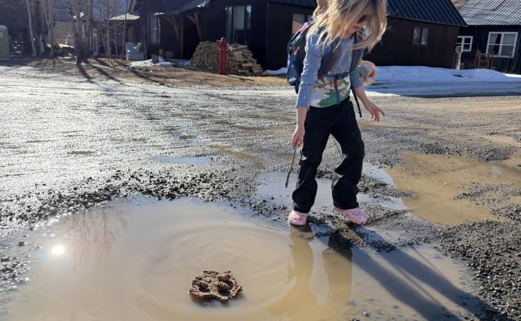 Willow Blankenship sailing her bark boat! Making the best out of our winter by playing in the mud puddles