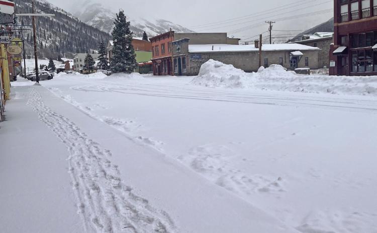 Photo credit Scott Fetchenhier The footprints of brave souls trekking through the snow in search of coffee.