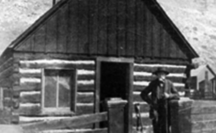 Silverton pioneer Francis Snowden, posed in front of his Silverton cabin, said to the first in town. His family was one of many benefiting from the contents of the Nossaman Archives this past year.