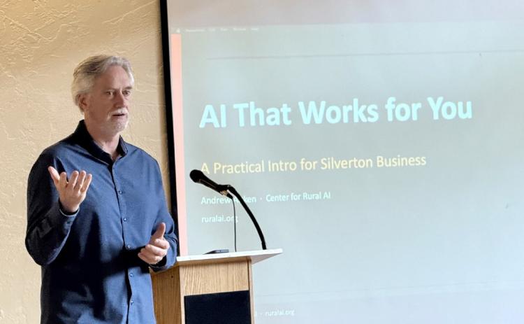 A professor from Ft Lewis gives a presentation on how to utilize AI in your small business photo by DeAnne Gallegos