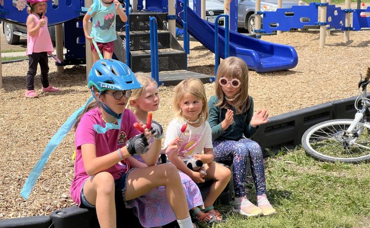 Photo credit Sterling Blankenship Local kids enjoying popsicles at Willow Blankenship’s birthday party in the park.