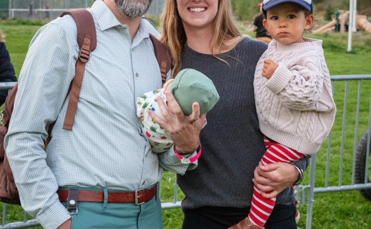 Alex Lanis, Meah Mordecai, and her daughter Katrina enjoy the arts festival photo by Cracked Compass
