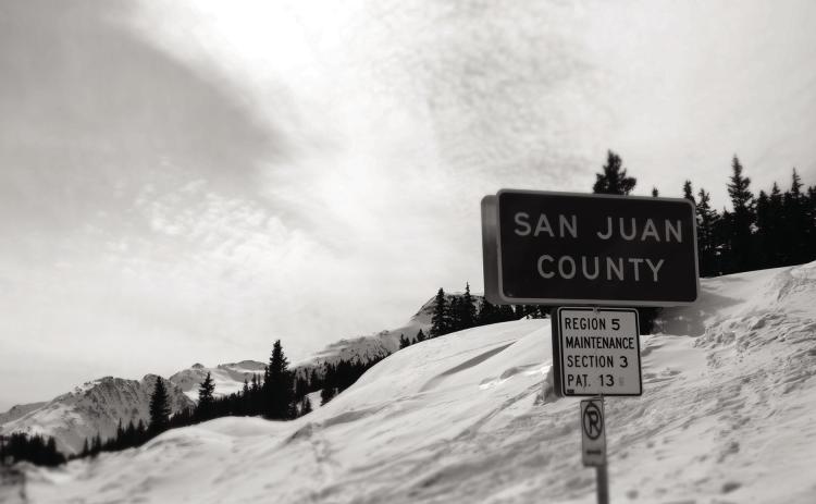 San Juan County sign on the top of Red Mountain Pass. Photo by Adam Andrade