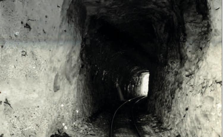 Railroad tunnel through avalanche debris, probably in 1906. Photo: San Juan Historical Society