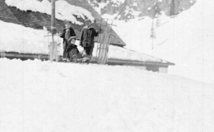 Eureka in 1932, with three boys sledding off the eaves of a company boarding house. The boys are Cliff Allen Jr., Van Rule and Edwin Larson Jr. Photo: San Juan Historical Society