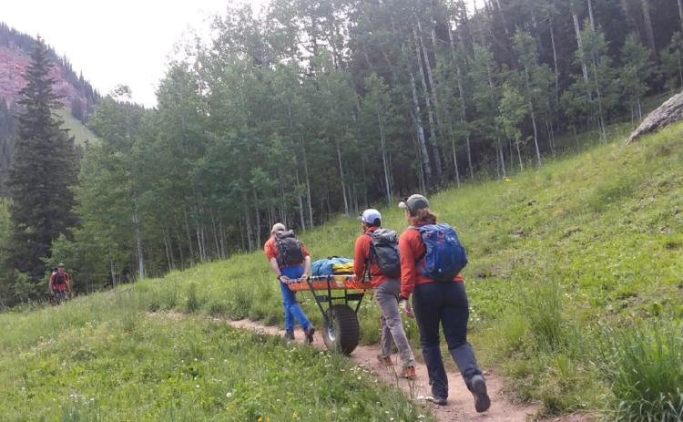 Silverton Medical Rescue hiking Ice Lakes Trail to assist an injured hiker on Sunday. Photo Credit Silverton Medical Rescue Team Member