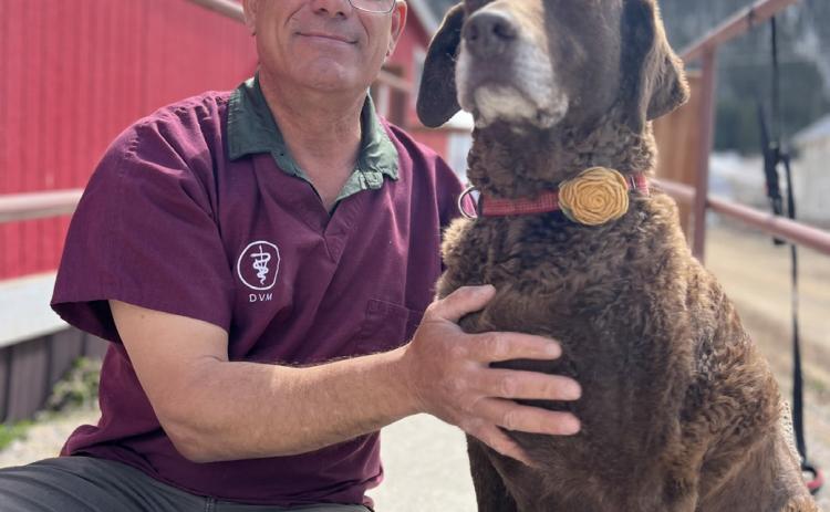 Photo credit DeAnne Gallegos Dr. Joe and Diesel Dog in front of the Silverton Senior Center during his monthly Silverton Veternarian pop up clinic