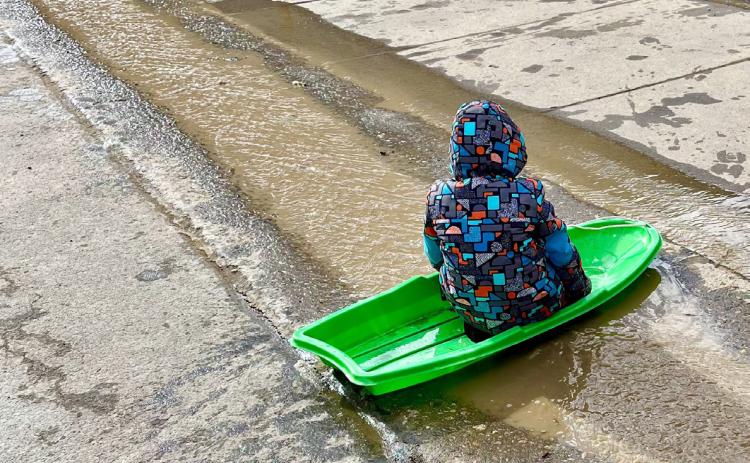 photo by Scott Fetchenhier When you can sled, you might as well kayak! Sledding in water instead of snow was all the rage for Christmas 2025