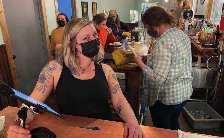 Despite having no internet access for several busy dining shifts, the crew at Avalanche Brewery made the best of it, and still kept bar and pizza patrons hydrated and fueled with food. Pictured: Jody Jean Philpot, Corrie Ann Paris, and Audrey Clark (to the side in yellow) survived their shifts with a smile :)