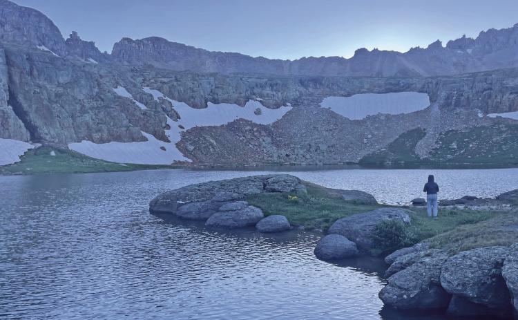 Nayeli Nateras enjoying sunset at one of San Juan County’s high mountain lakes Photo by Katey Fetch