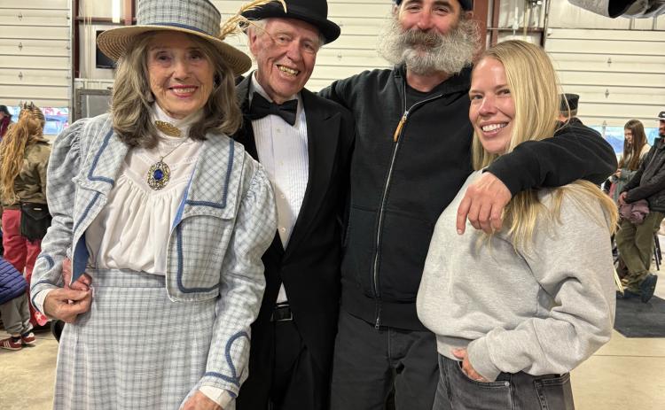 Carolyn and Richard Wilcox pose with Angelo and Allyn, same color scheme, different decade of clothing. Very fitting for the 150th Anniversary party photo by DeAnne Gallegos