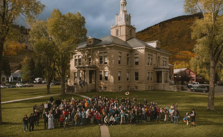 The San Juan County community group photo taken by local photographer Critt Kuenning from the town’s man lift