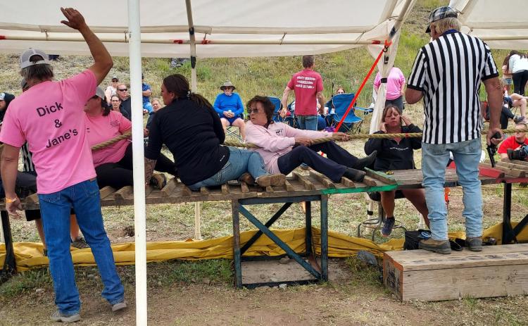 Photo by Hardrockers Judy Kuhlman pulls for Dick &amp; Janes tug a war team at this years’ Hardrockers Holidays.