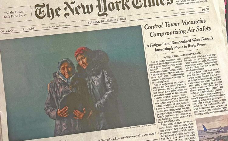 The front page of the Sunday Edition New York Times. Photo credit DeAnne Gallegos