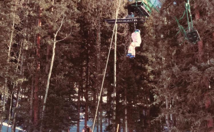 Parents, kids, and one awesome ski instructor were in chairs when the lift stopped. The rescue team calmly evacuated everyone in a couple hours. Photo Credit Megan Brosh