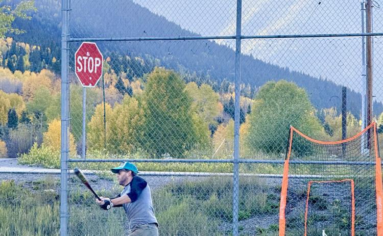 Chris Brosh knocks the ball out of the park on Sunday night photo by DeAnne Gallegos