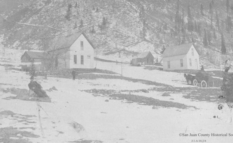 The settlement at Boulder Gulch northeast of Silverton in 1876. Years layer it was temporarily platted as Lemoyne City, just south of Boulder Creek. The frame house at right was the home of John and McIvina Reed, and the center was owned by John Day. Tim Parker Plantz cabin is behind it. San Juan County Historical Society