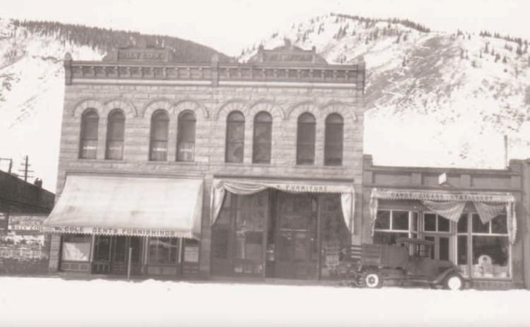 GREENE STREET, 1930 Silverton Standard &amp; the Miner file photo Business fronts on Greene Street in the 1930s, including Fritz Hoffman’s Furniture and Hardware store and the Post Office Store housing the U.S. Post Office, right. A stake bed pickup with chains on the rear wheels is parked in front of the Post Office Store.