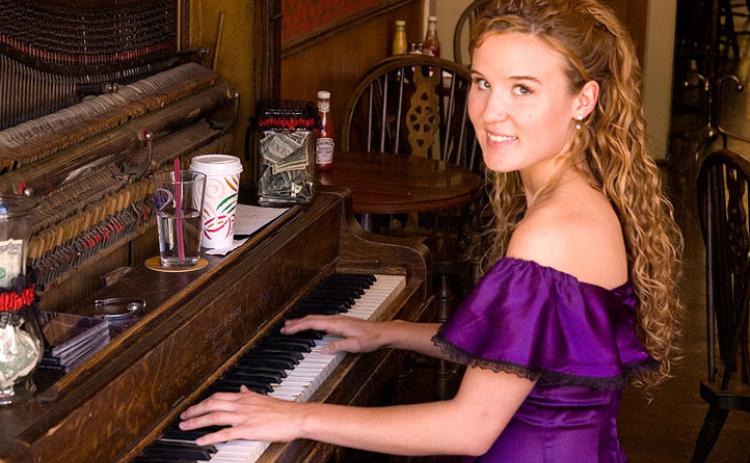 Lacey Black has played piano at the Saloon since 2000 and is now the owner. Photo by Lacey Rose Saloon