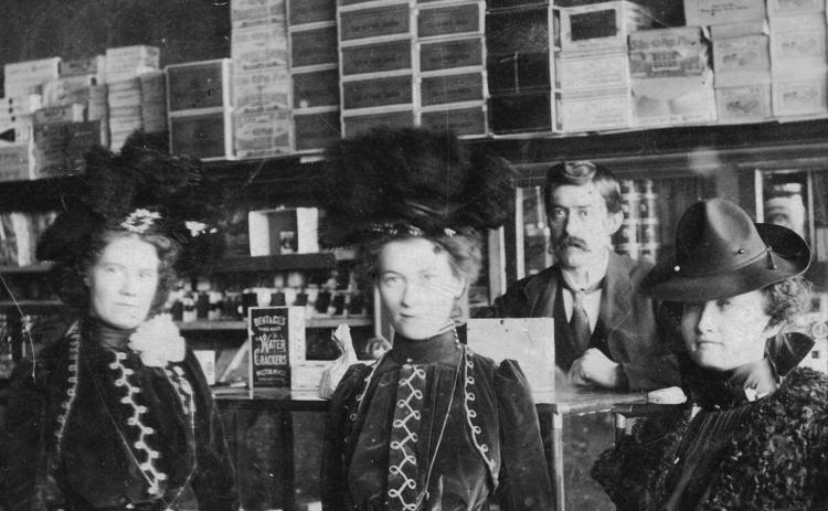 Photo courtesy of San Juan County Historical Society Barney Tocco at his shop at 1246 Blair Street, with three unidentified women in an undated photo. Barney opened the Piemonte store in 1909, carrying shoes, boots, dry goods, groceries and tobacco.