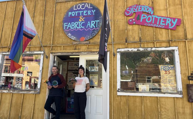 Silverton local art gallery owners Ian Tanner and Evin Harris in front of their colorful shop Photo credit DeAnne Gallegos