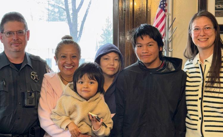San Juan County Sheriff Steve Lowrance with his wife Norma, their children and San Juan County Judge Kelly Tompkins at his swearing in on Wednesday 4/1/2026 photo by Alex Lanis