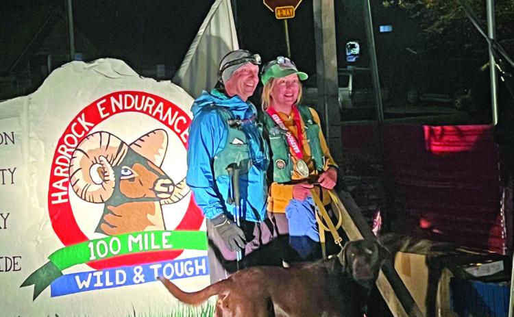 Finisher and Silverton local Amanda Grimes, her husband Billy, and their dog Taj. Photo Credit Deanne Gallegos