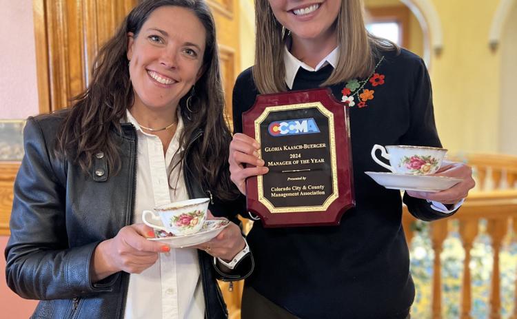 Mayor Dayna Kranker &amp; Gloria Kaasch-Buerger celebrated her manager of the year award at the surprise Heavy Metal Tea Party in town hall this past Spring. Photo by DeAnne Gallegos