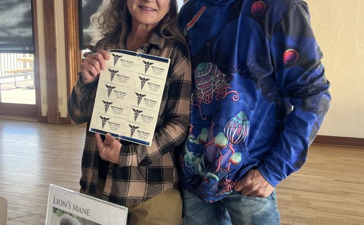 Local Mushroom growers Mount Olympus partners Lisa Risoli and Bill Hamm sold a lot of products at the Silverton Winter Farmers Market . Photo credit DeAnne Gallegos