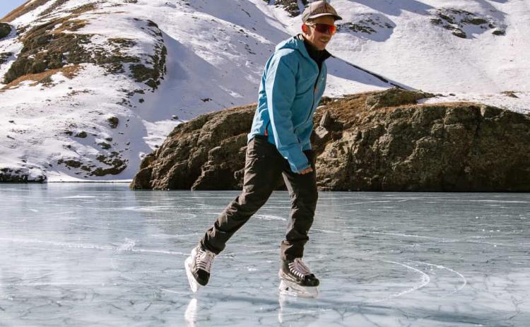 Photo By Critt Kuenning Ice season up high on top of the San Juans has started. Silverton local Joel Kuenning takes a skate on alpine ice.